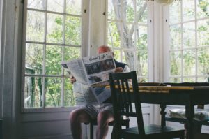 Old Man Reading Newspaper